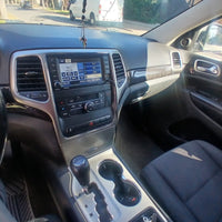 Jeep Grand Cherokee 2012 Laredo 3.6 AT – Potencia, seguridad y confort en un solo SUV